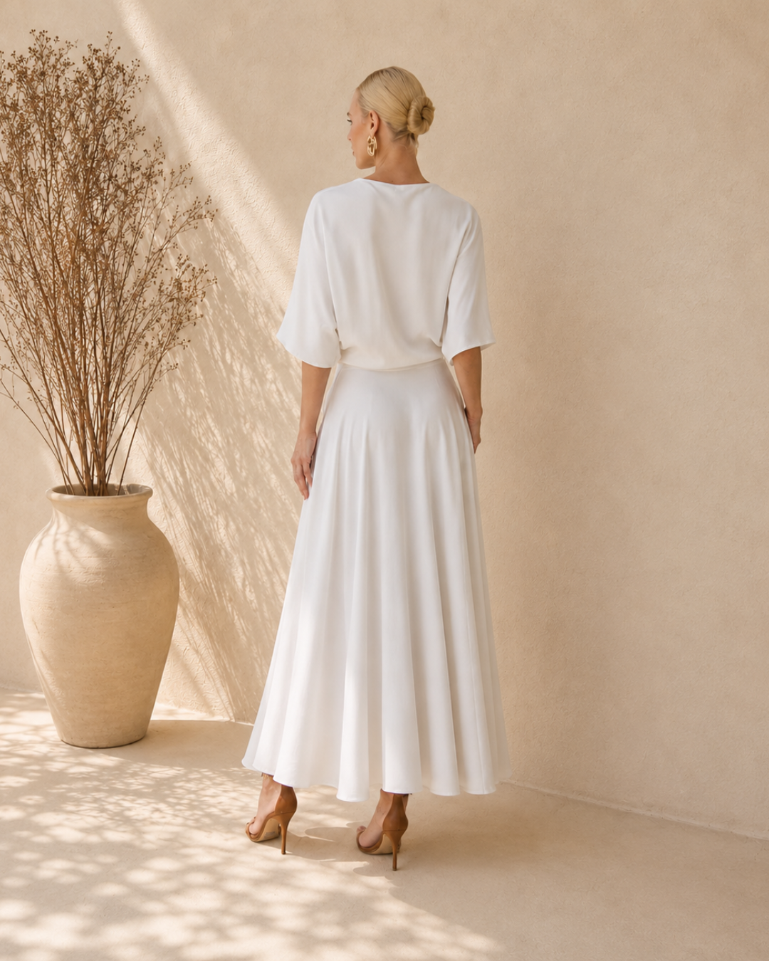 Vestido midi de corte asimétrico