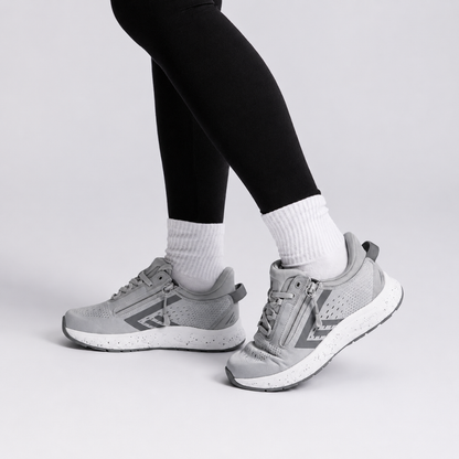 Zapatos adaptables con doble cremallera