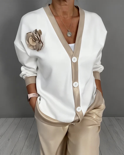 Conjunto elegante de camisa y pantalones de corte relajado para mujer