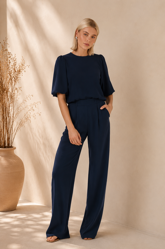 Conjunto elegante con caída fluida